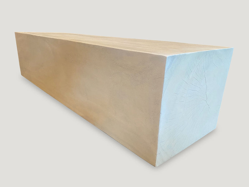 Minimalist Bleached Log Floating on Stainless Steel Cylinders