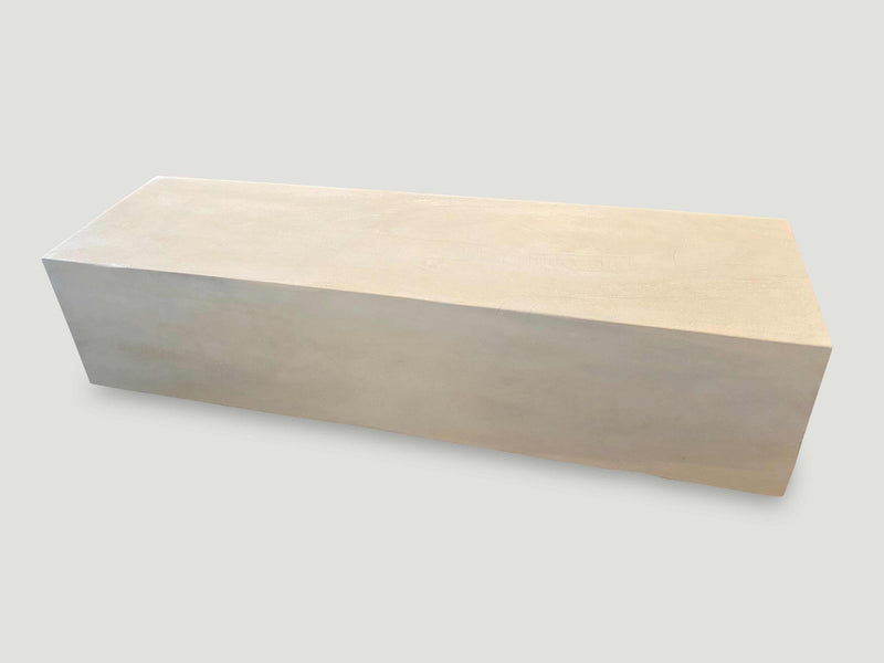 Minimalist Bleached Log Floating on Stainless Steel Cylinders