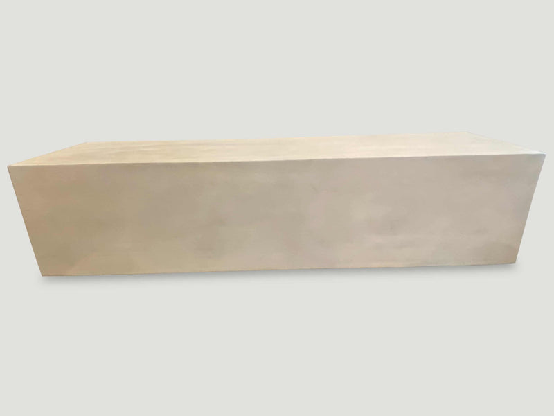 Minimalist Bleached Log Floating on Stainless Steel Cylinders