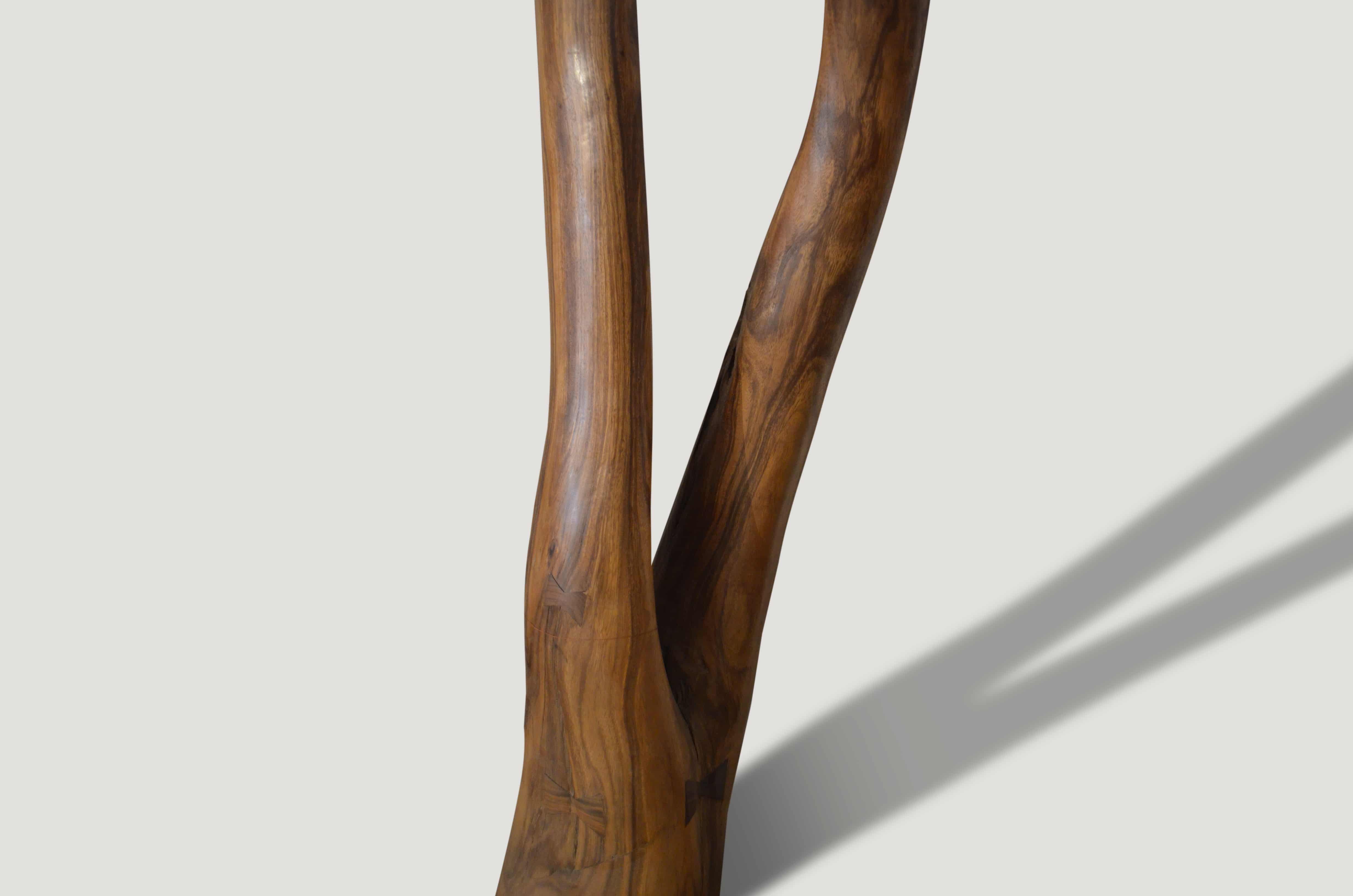 girl upside down suar wood sculpture