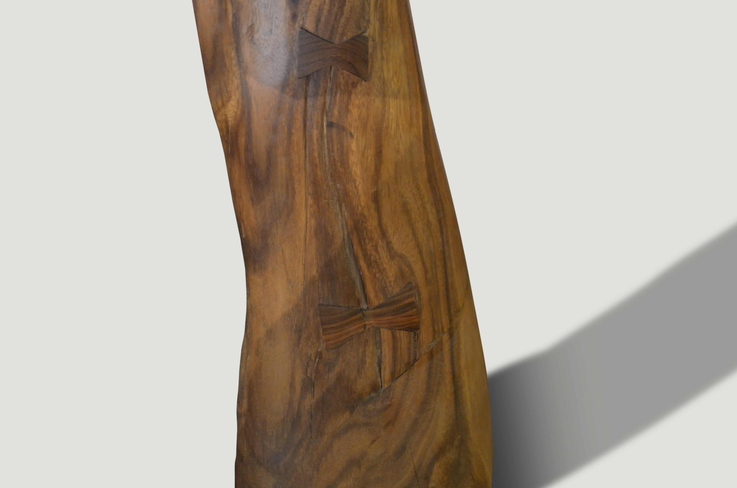 girl upside down suar wood sculpture