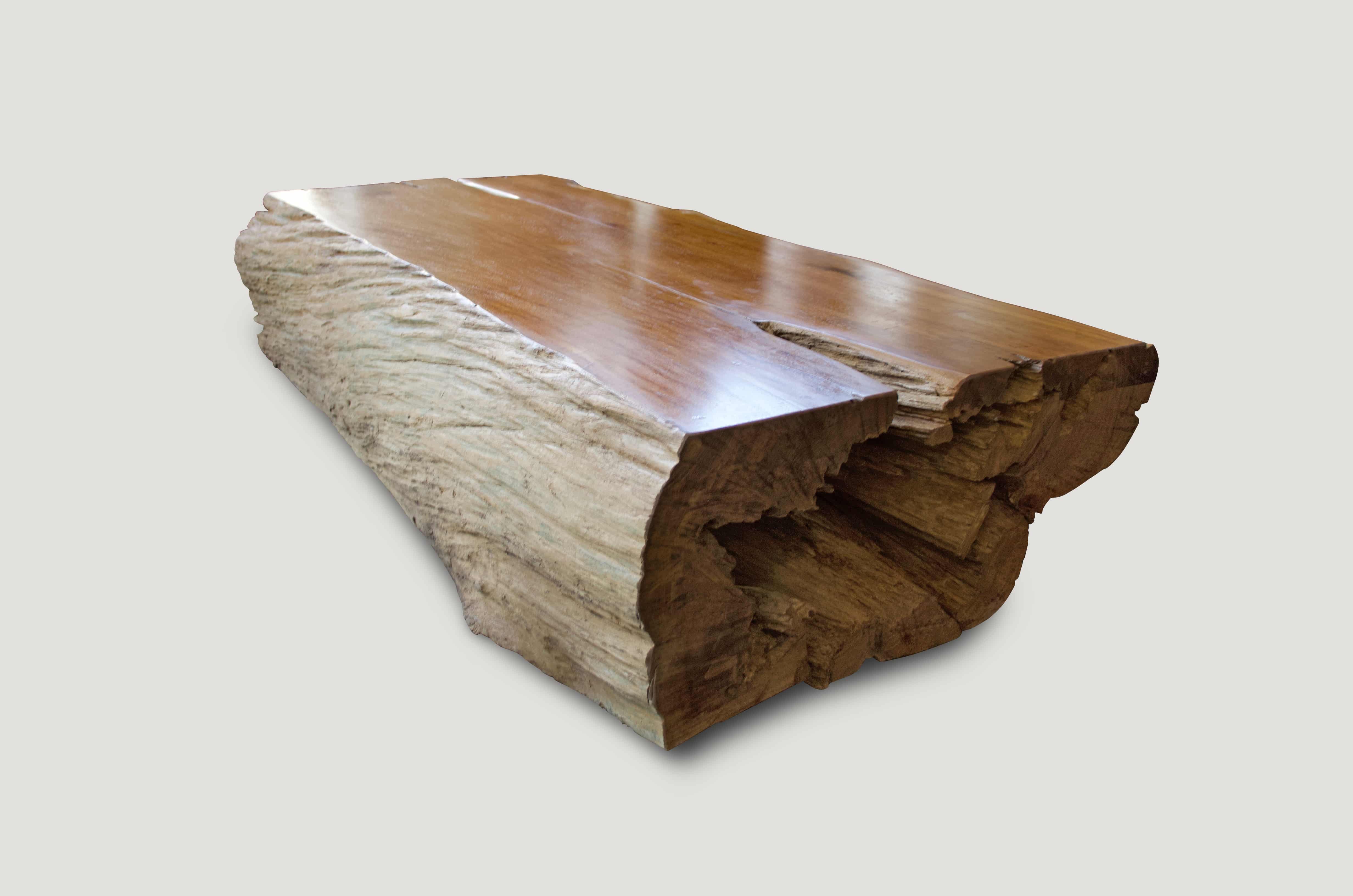 polished teak wood log coffee table