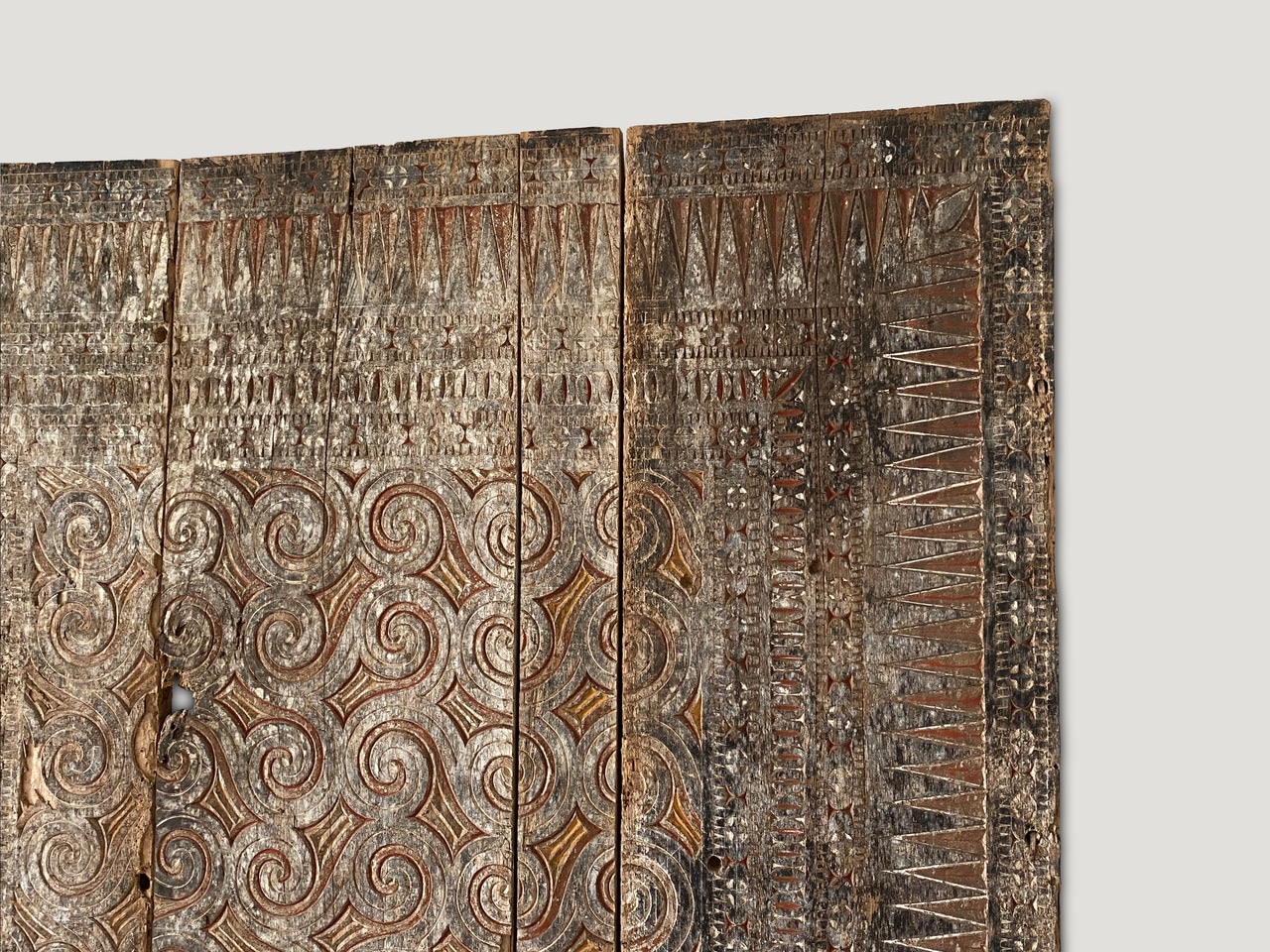 hand-carved ancient panel from Toraja,