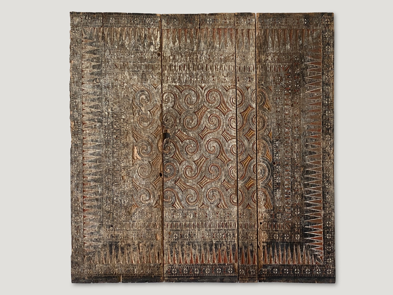 hand-carved ancient panel from Toraja,