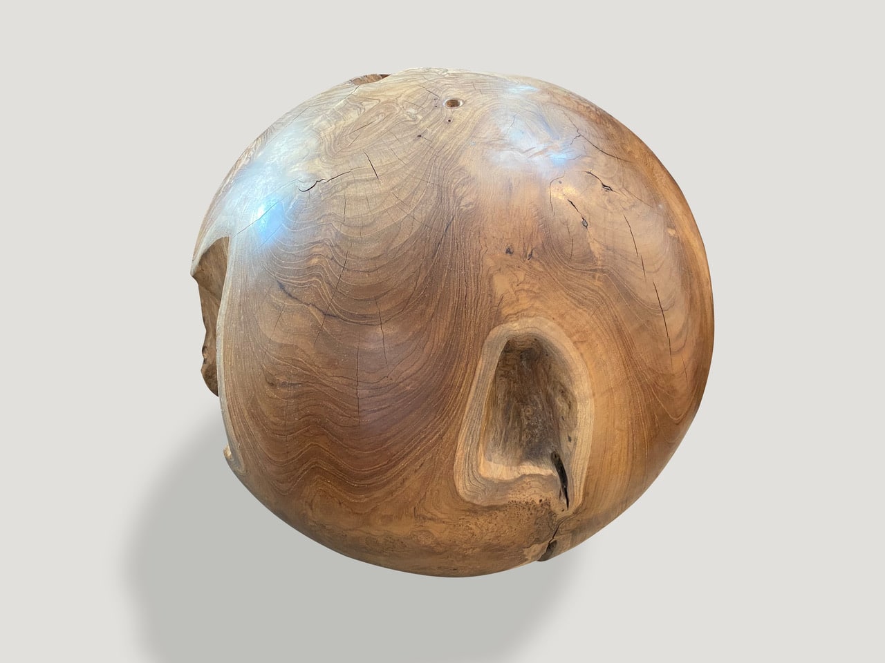 Natural teak root sphere