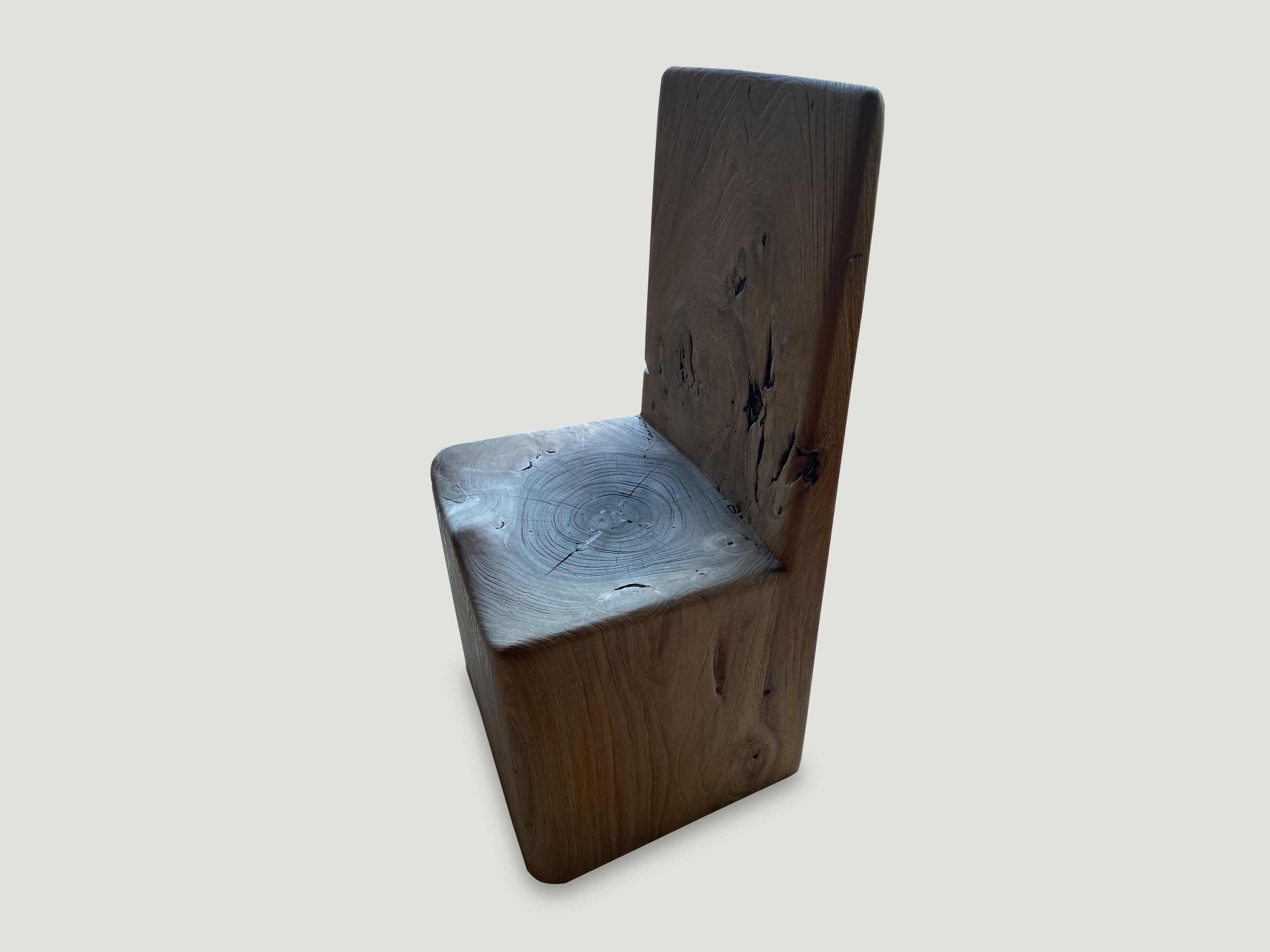 sculptural solid teak wood chair