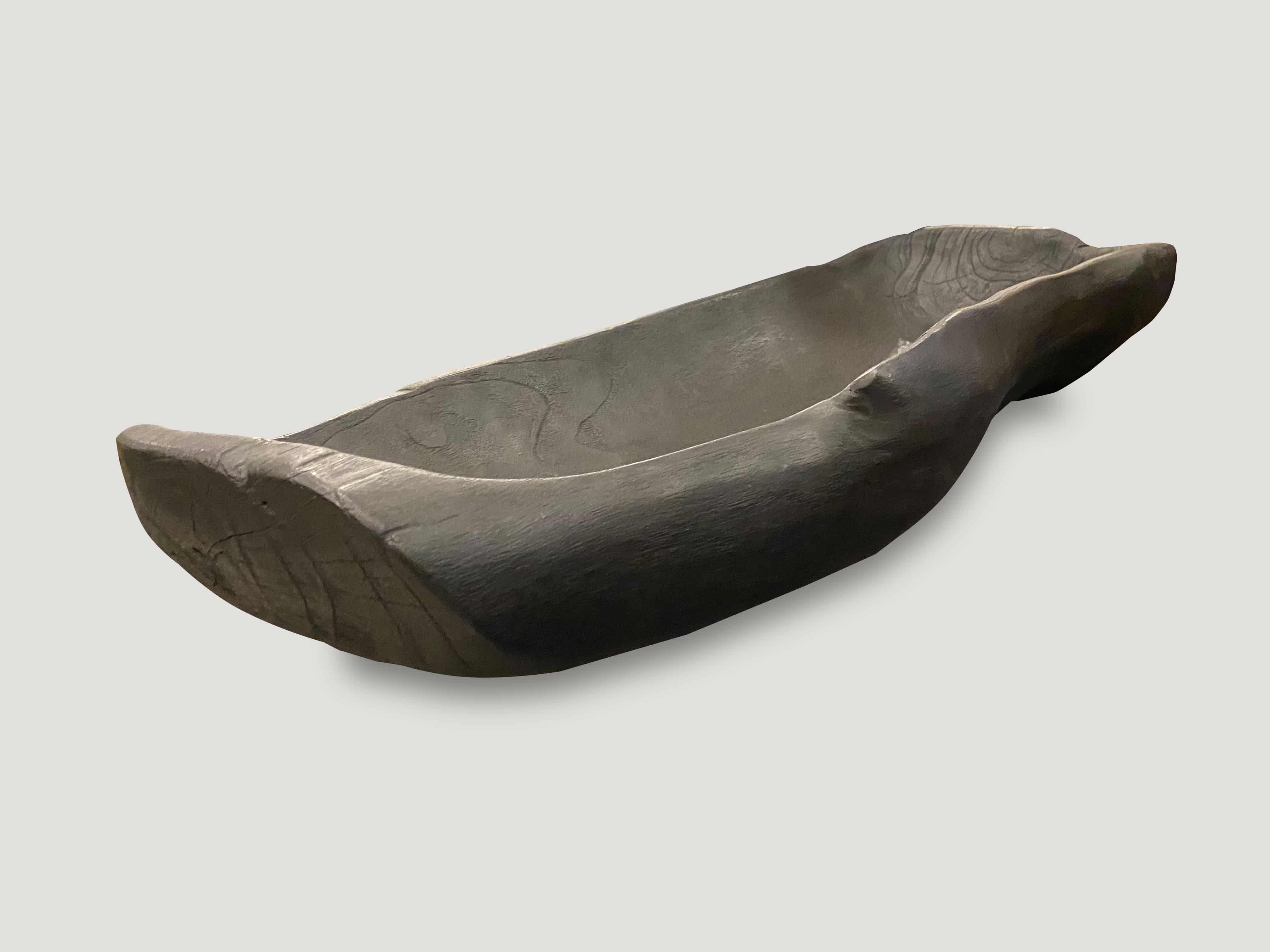 charred teak wood vessel