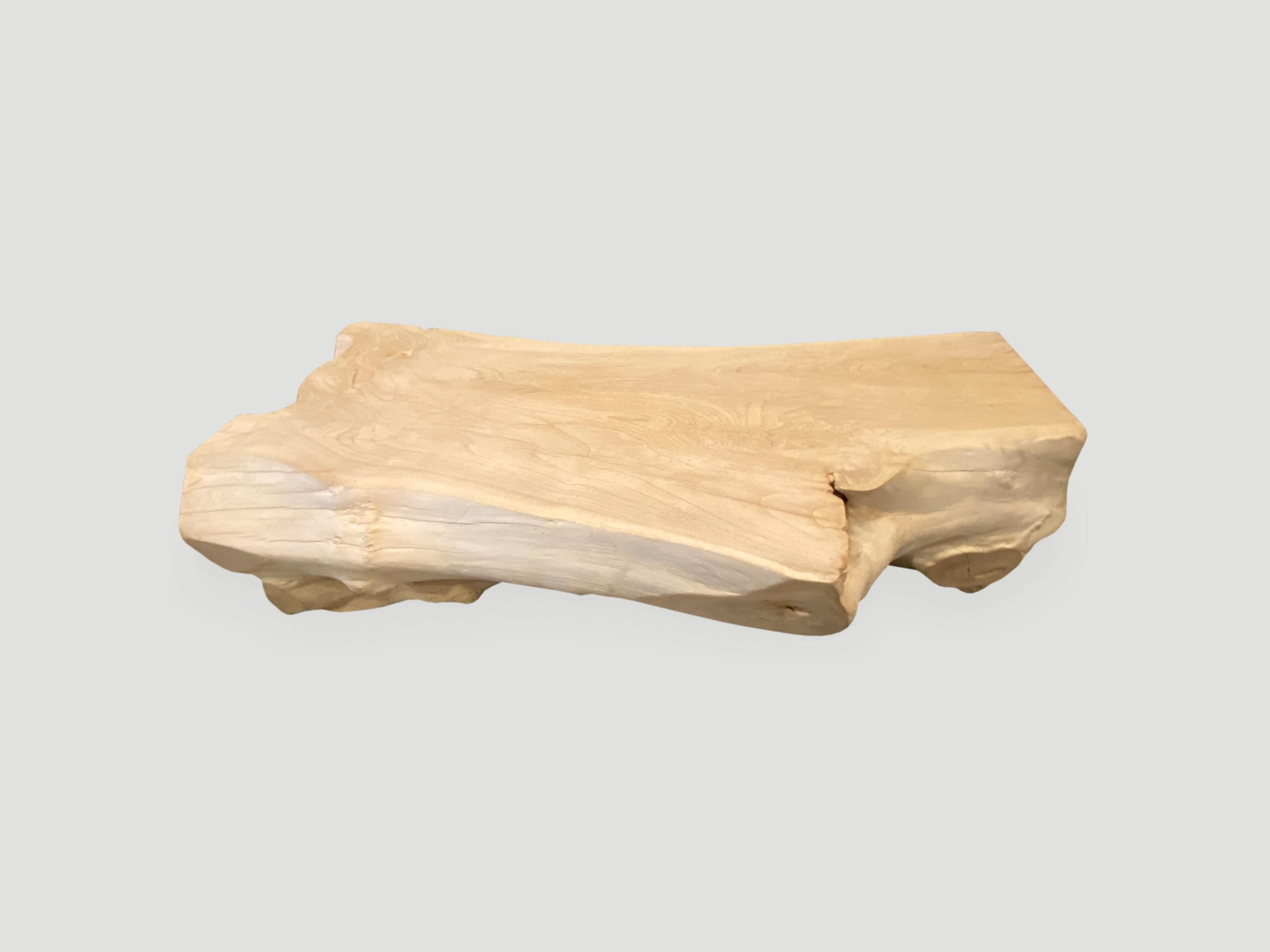 single slab coffee table or bench made from a hundred year old reclaimed teak root