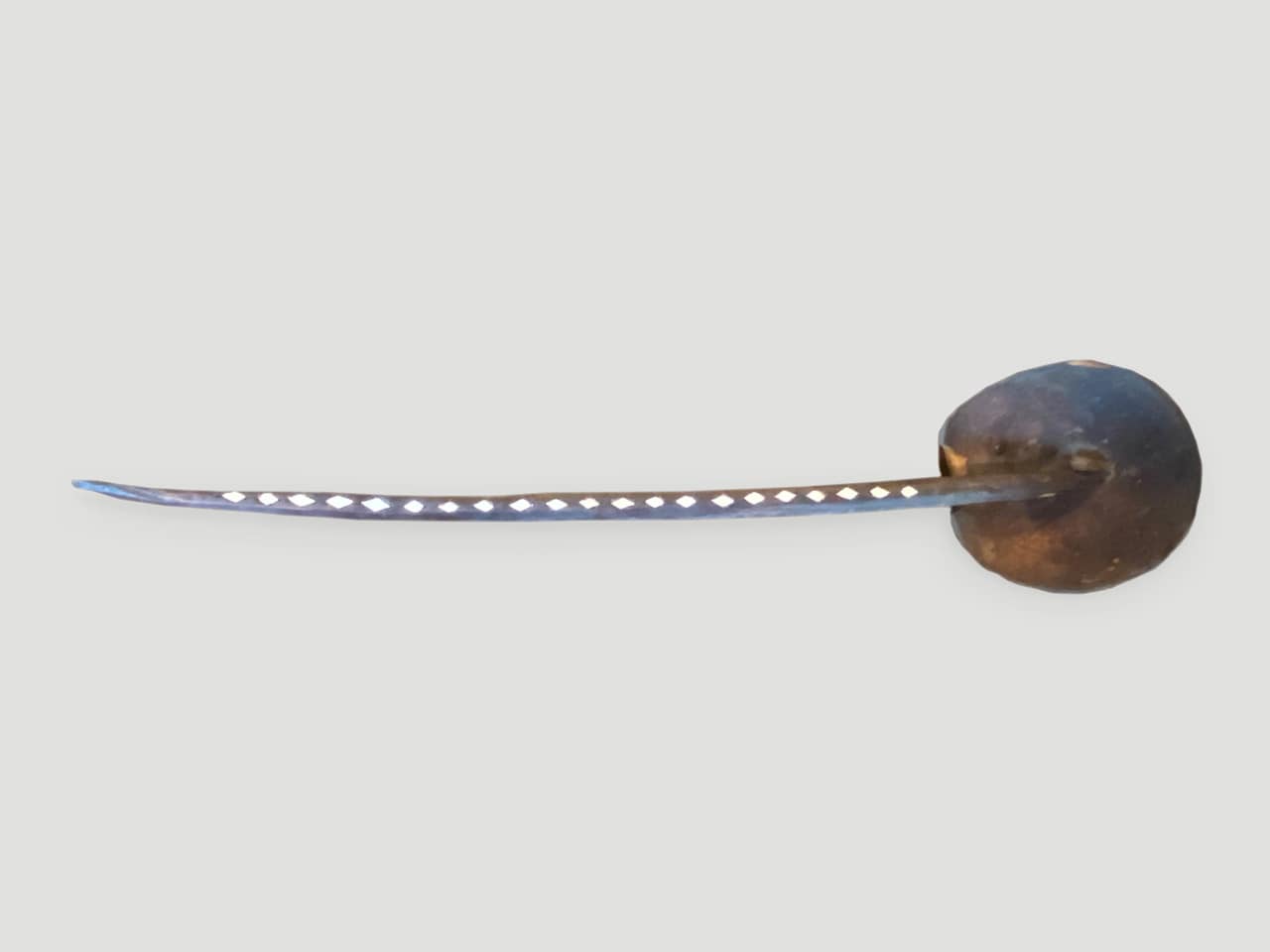unique wooden ladle with a half coconut shell attached