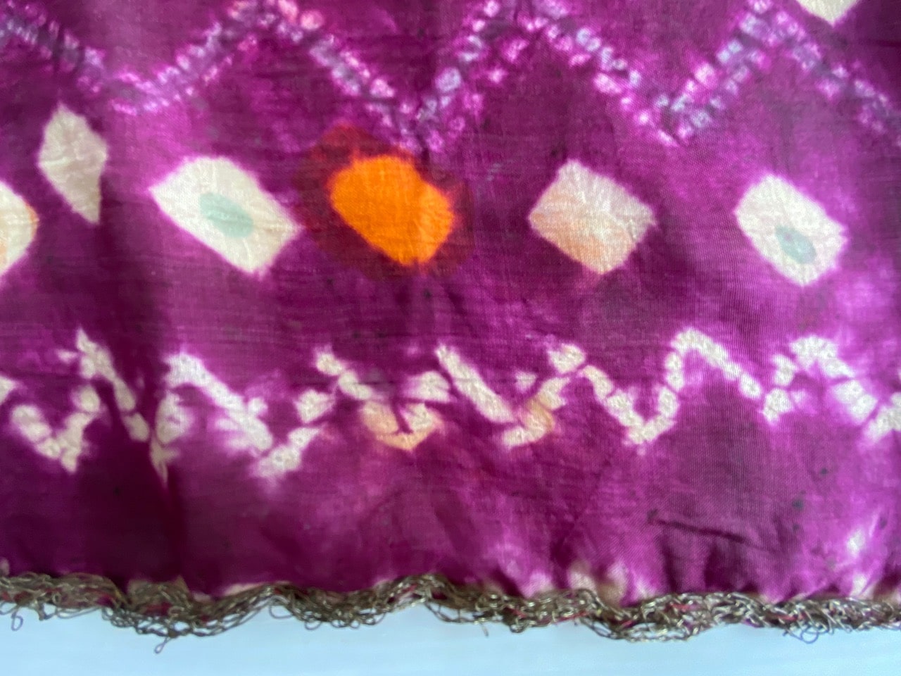 orange and purple silk textile