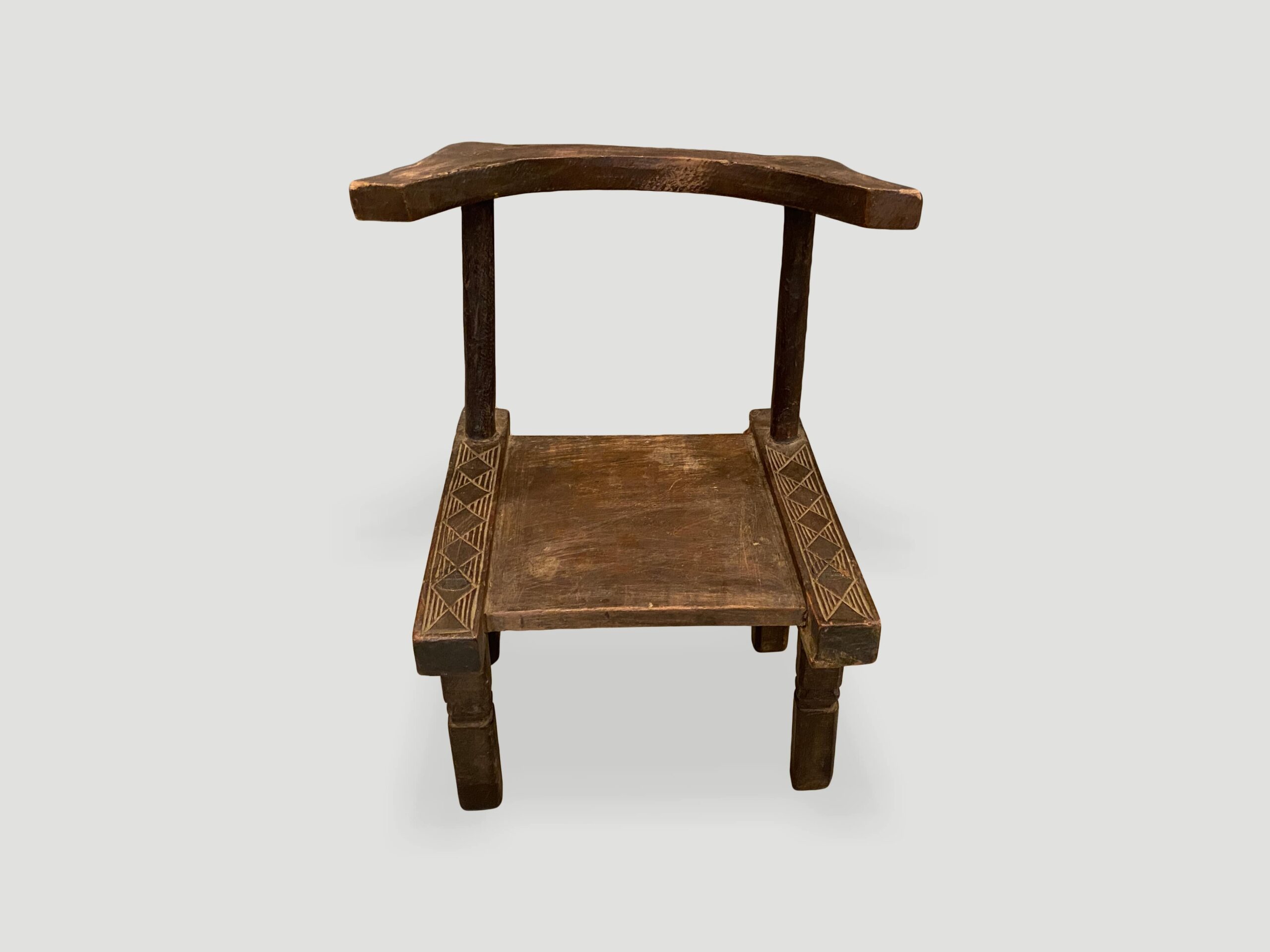 Hand carved wooden chair from the Ivory Coast of Africa