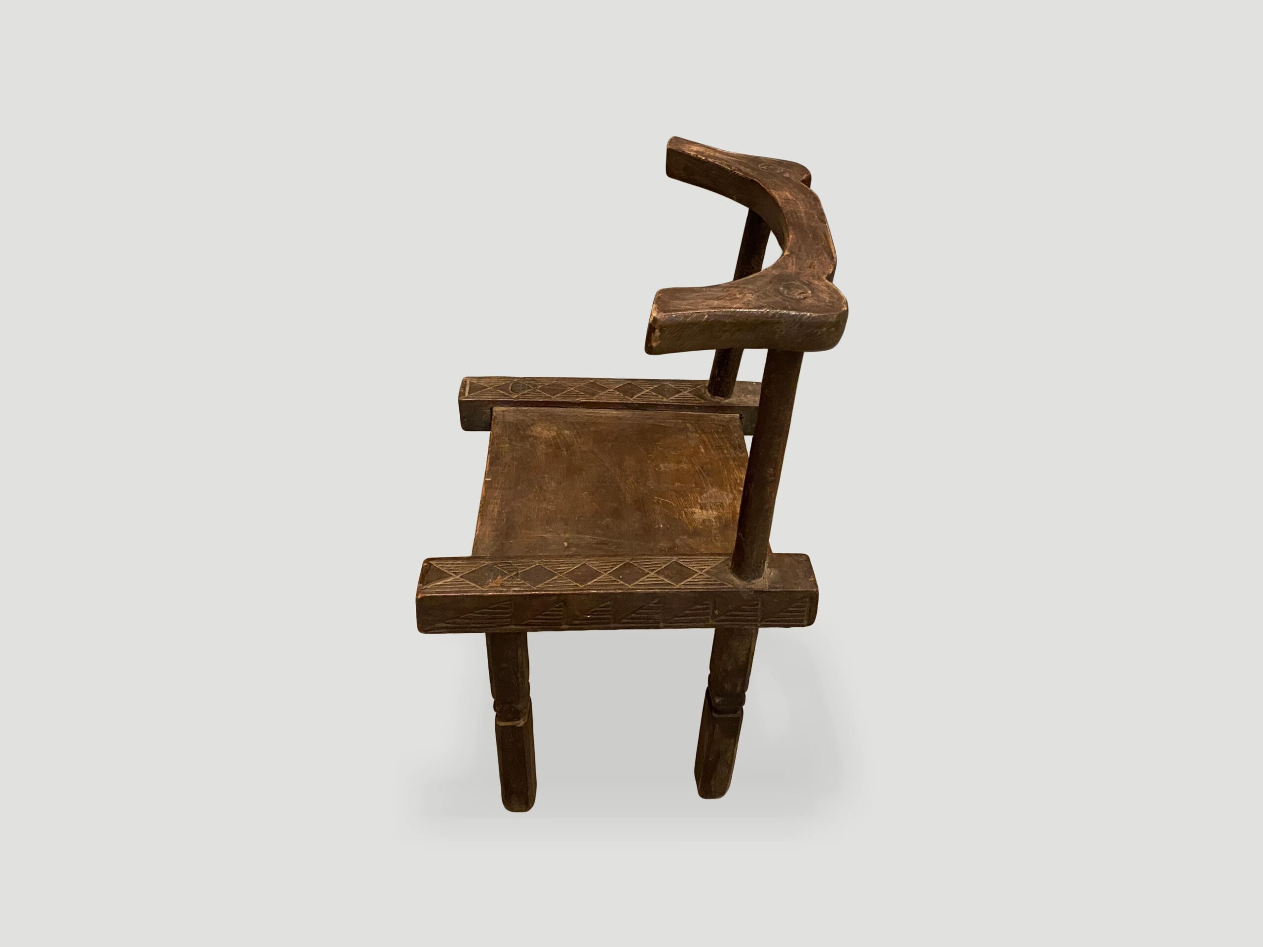 Hand carved wooden chair from the Ivory Coast of Africa
