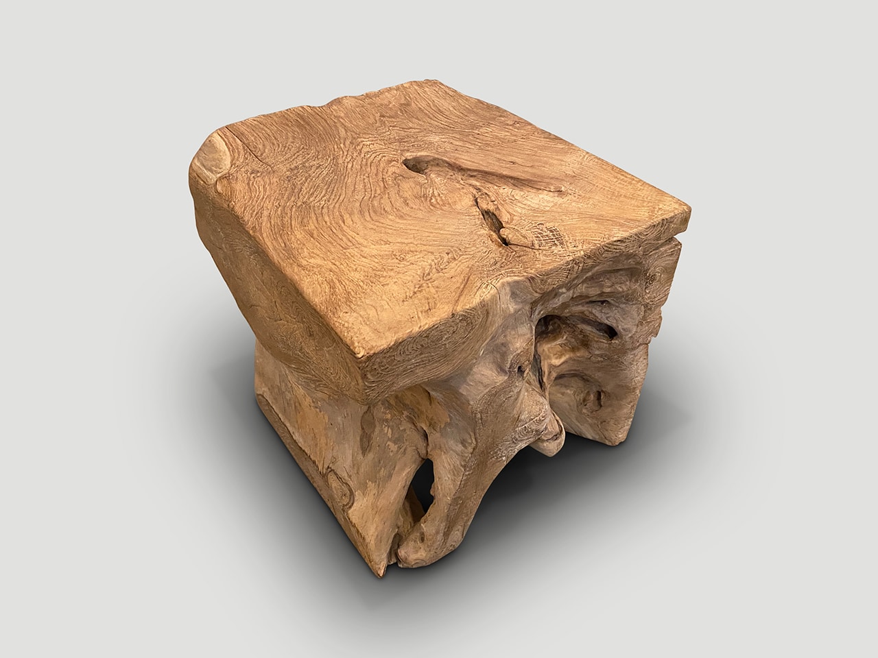 aged teak wood side table