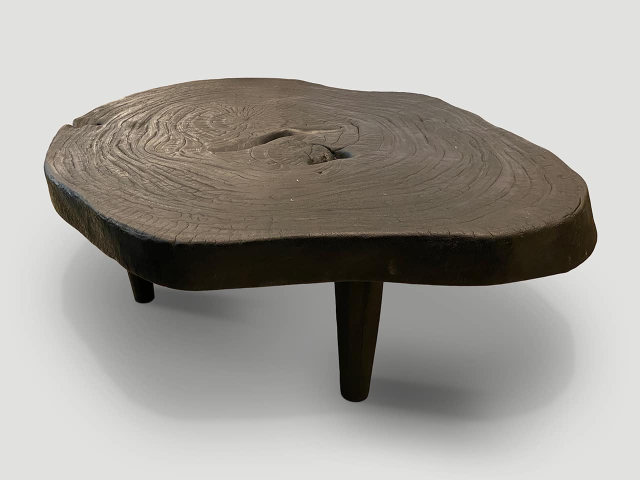 single slab coffee table, set on cone shaped mid century style legs