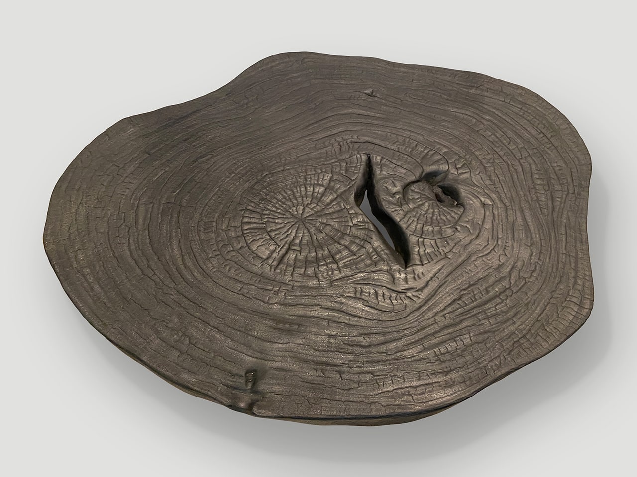 single slab coffee table, set on cone shaped mid century style legs