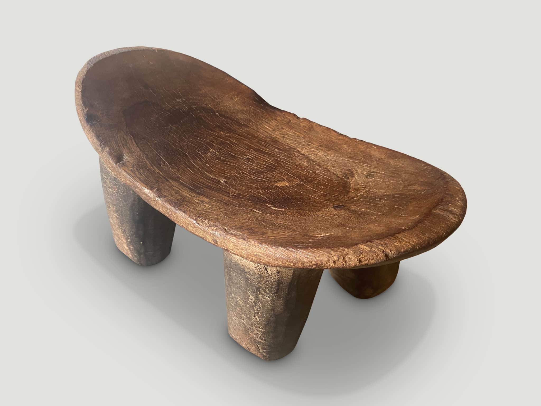 African stool or side table hand carved from a single block of wood
