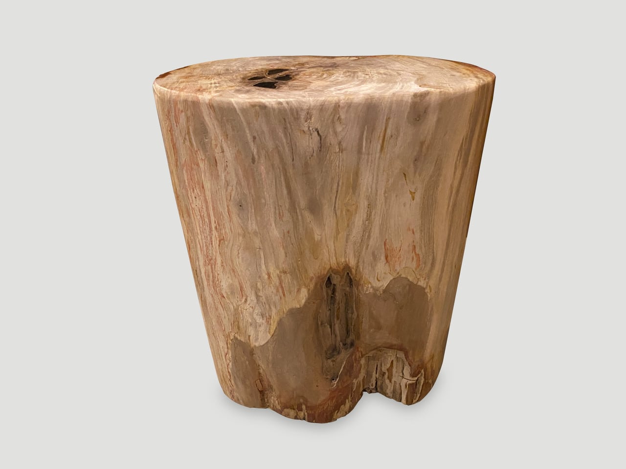 coral toned high quality petrified wood side table