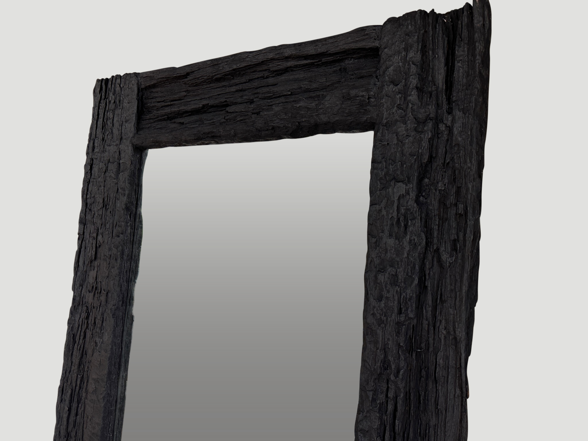charred iron wood frame mirror