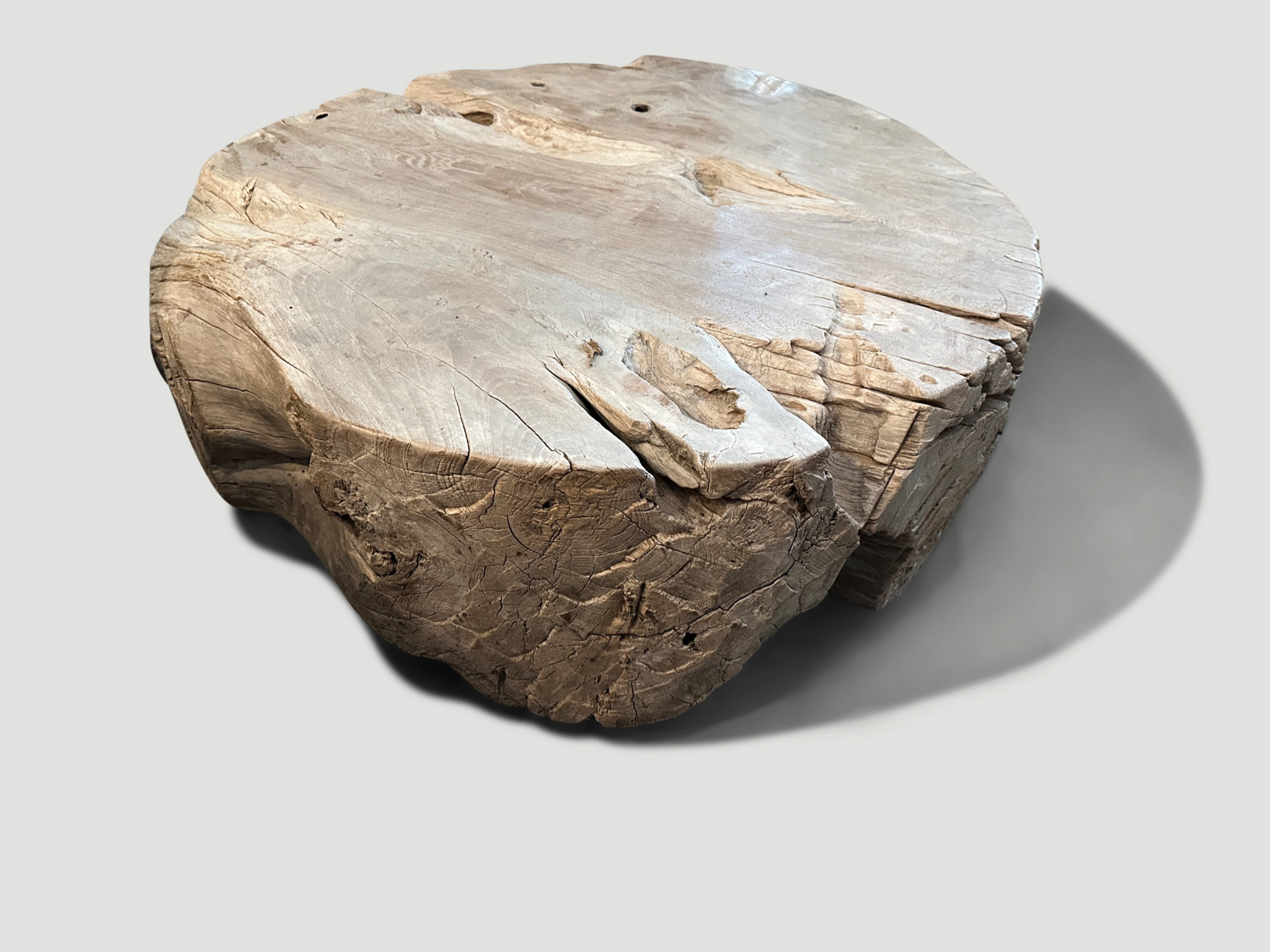 aged teak wood round coffee table