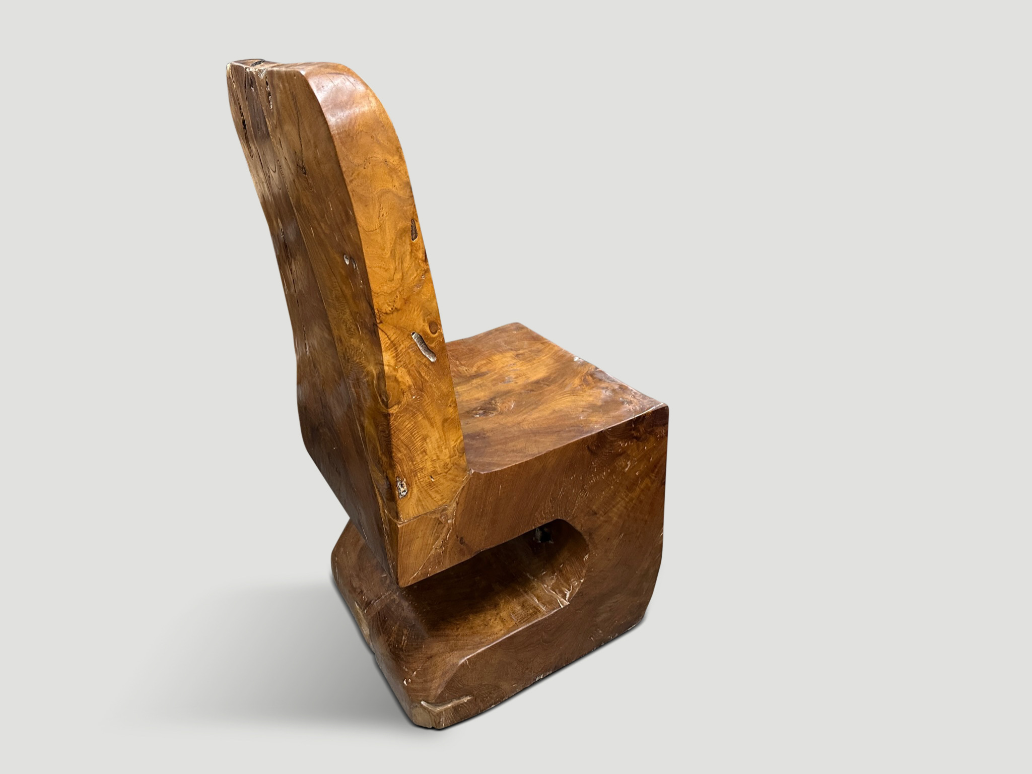 aged teak wood hand carved chair