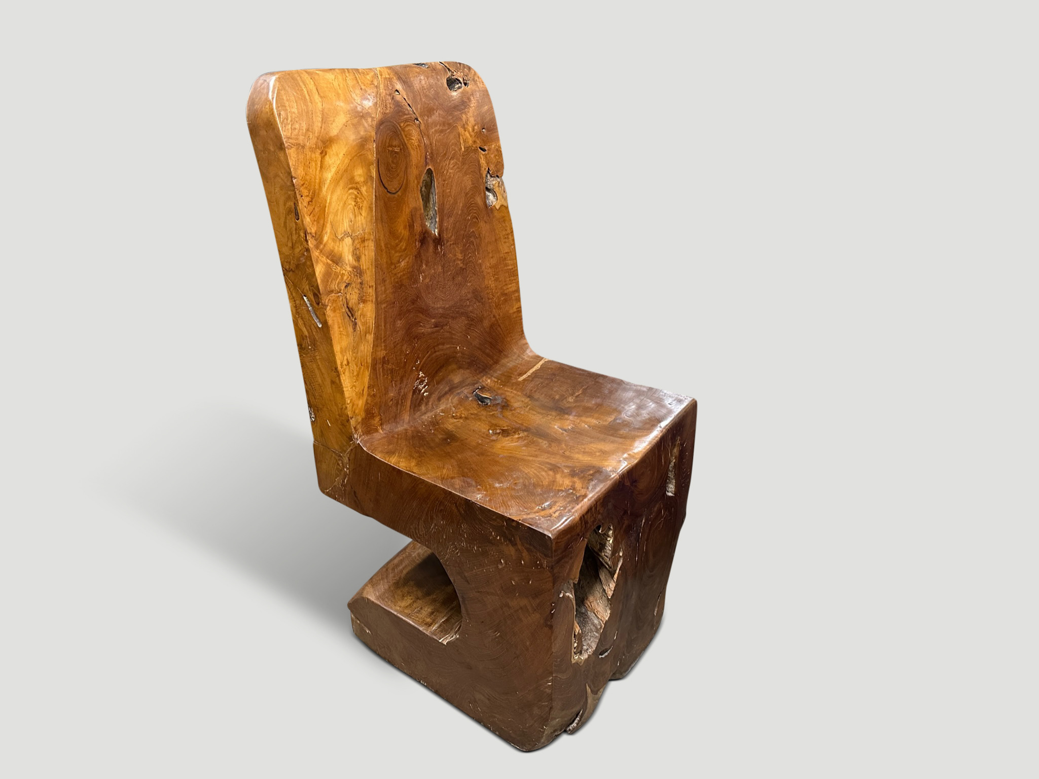 aged teak wood hand carved chair