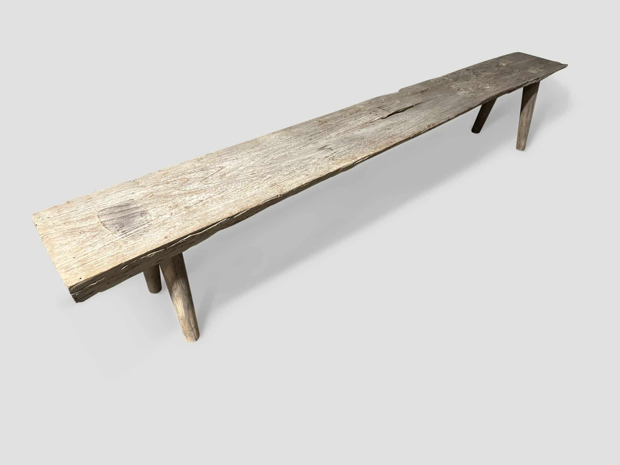 teak bench with minimalist legs