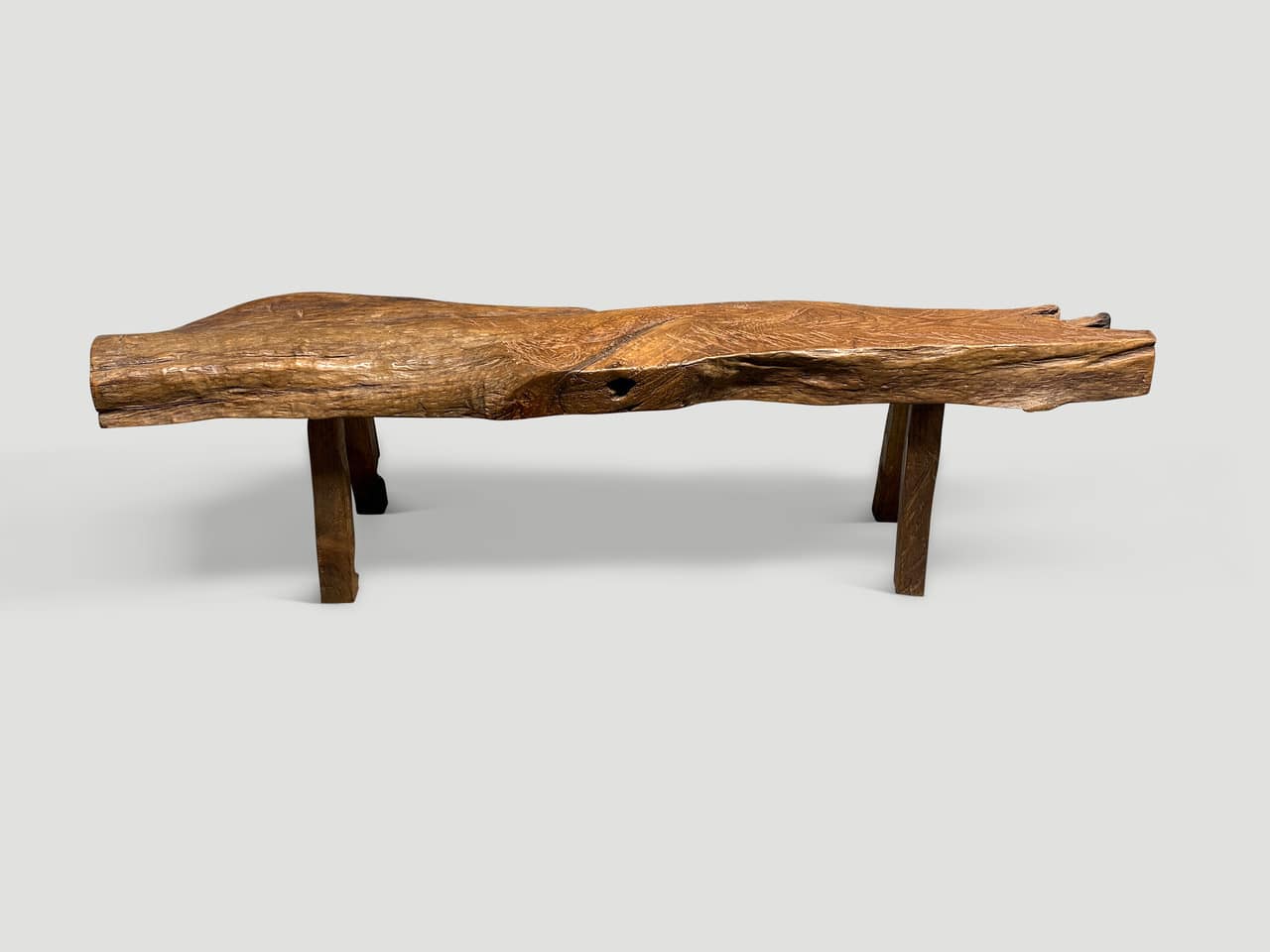 antique sculptural teak wood log bench