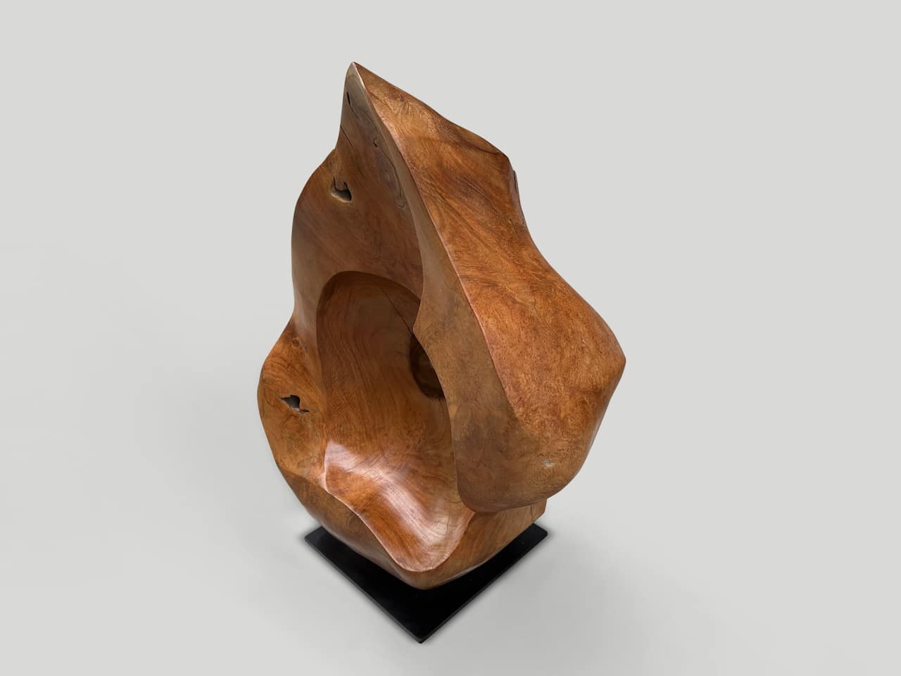 minimalist teak wood sculpture