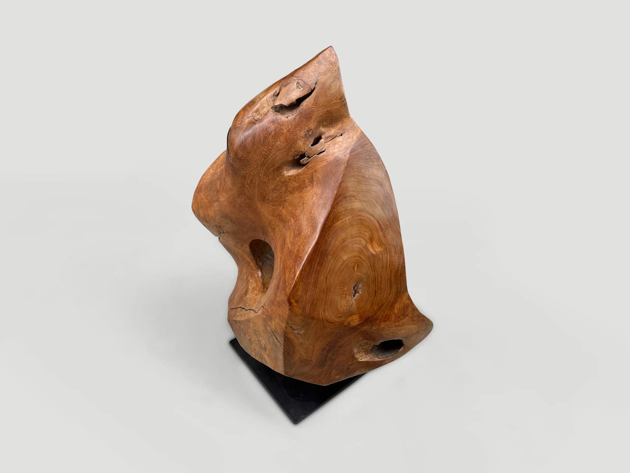 minimalist teak wood sculpture