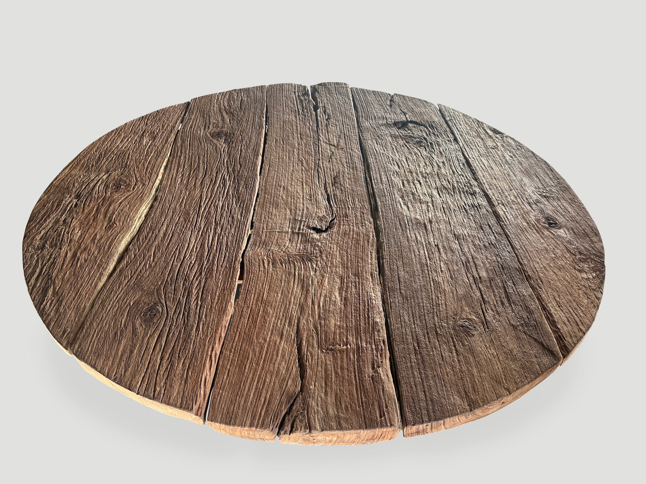 impressive round teak wood table