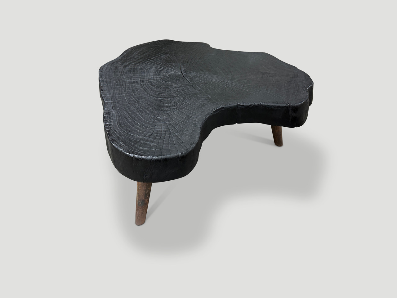 amorphous charred wood coffee table