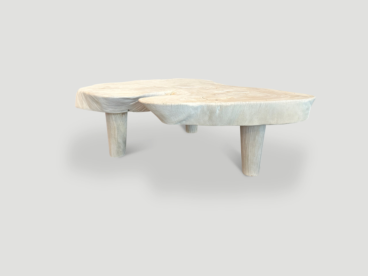 amorphous mid century style bleached suar wood coffee table