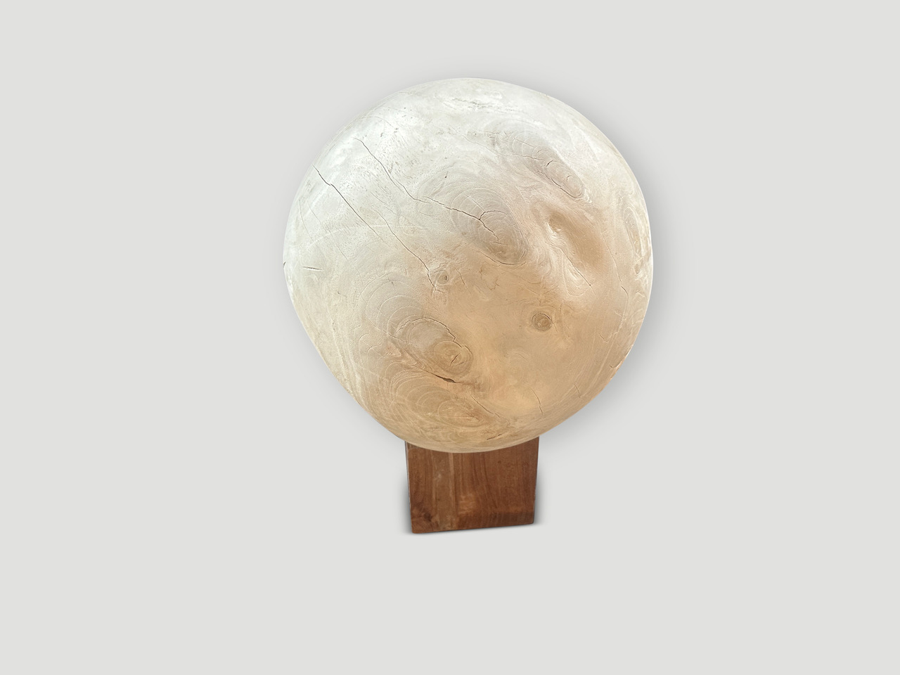 sculptural bleached sphere on a stand