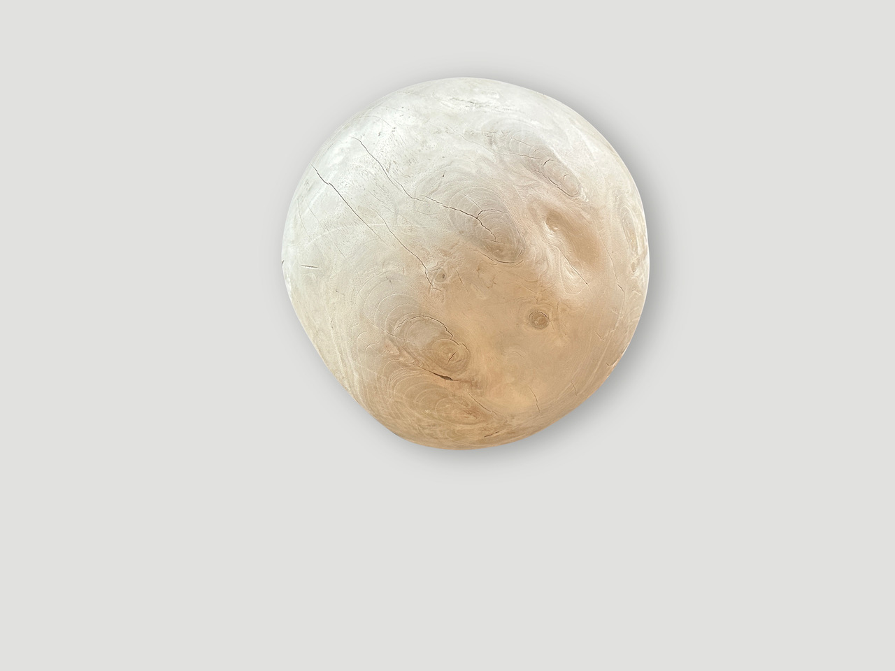 sculptural bleached sphere on a stand