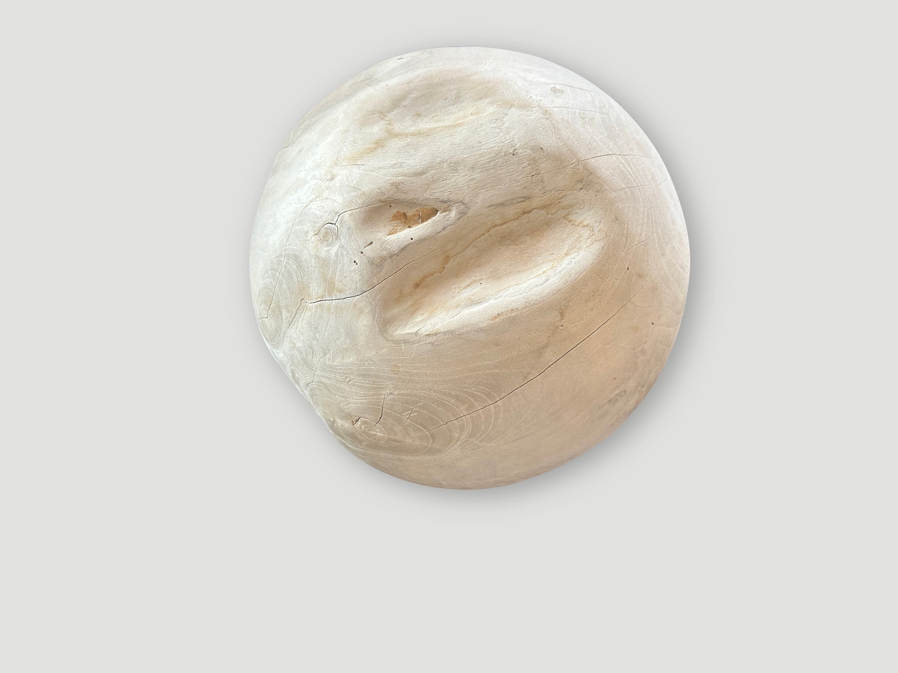 sculptural bleached sphere on a stand