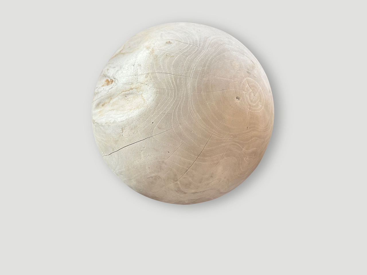 sculptural bleached sphere on a stand