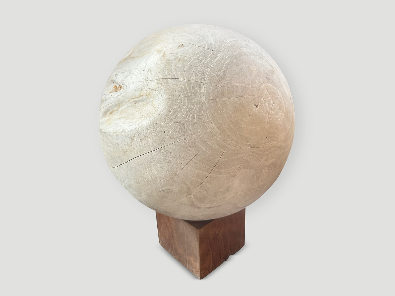 sculptural bleached sphere on a stand