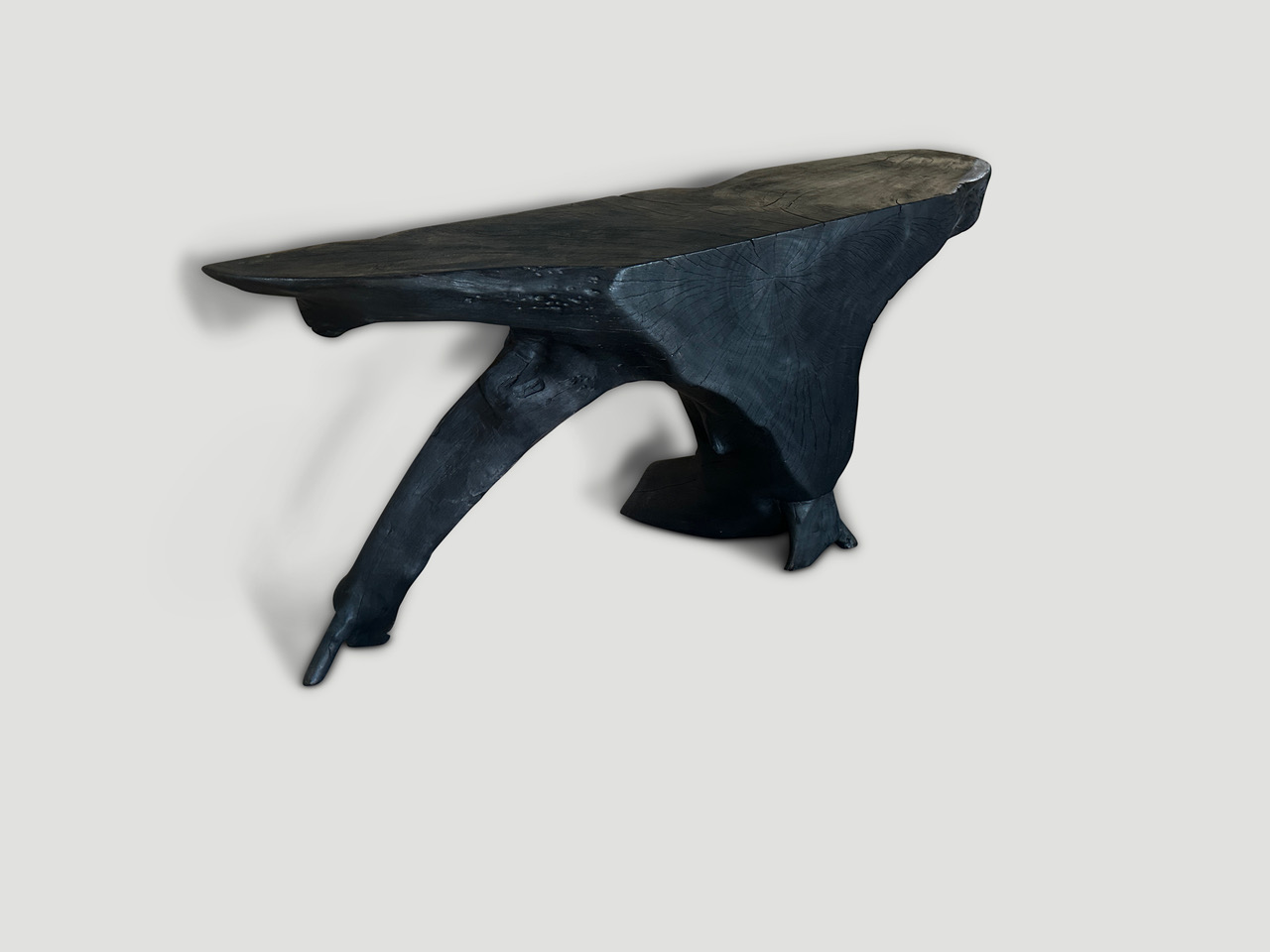 sculptural charred console table