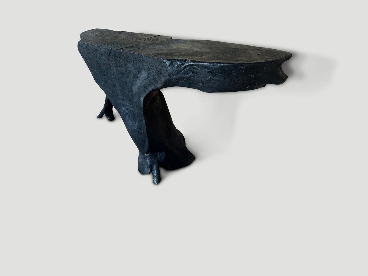 sculptural charred console table