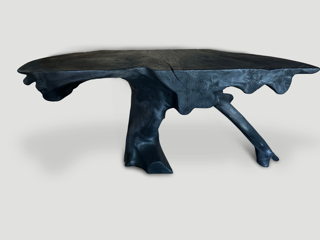 sculptural charred console table