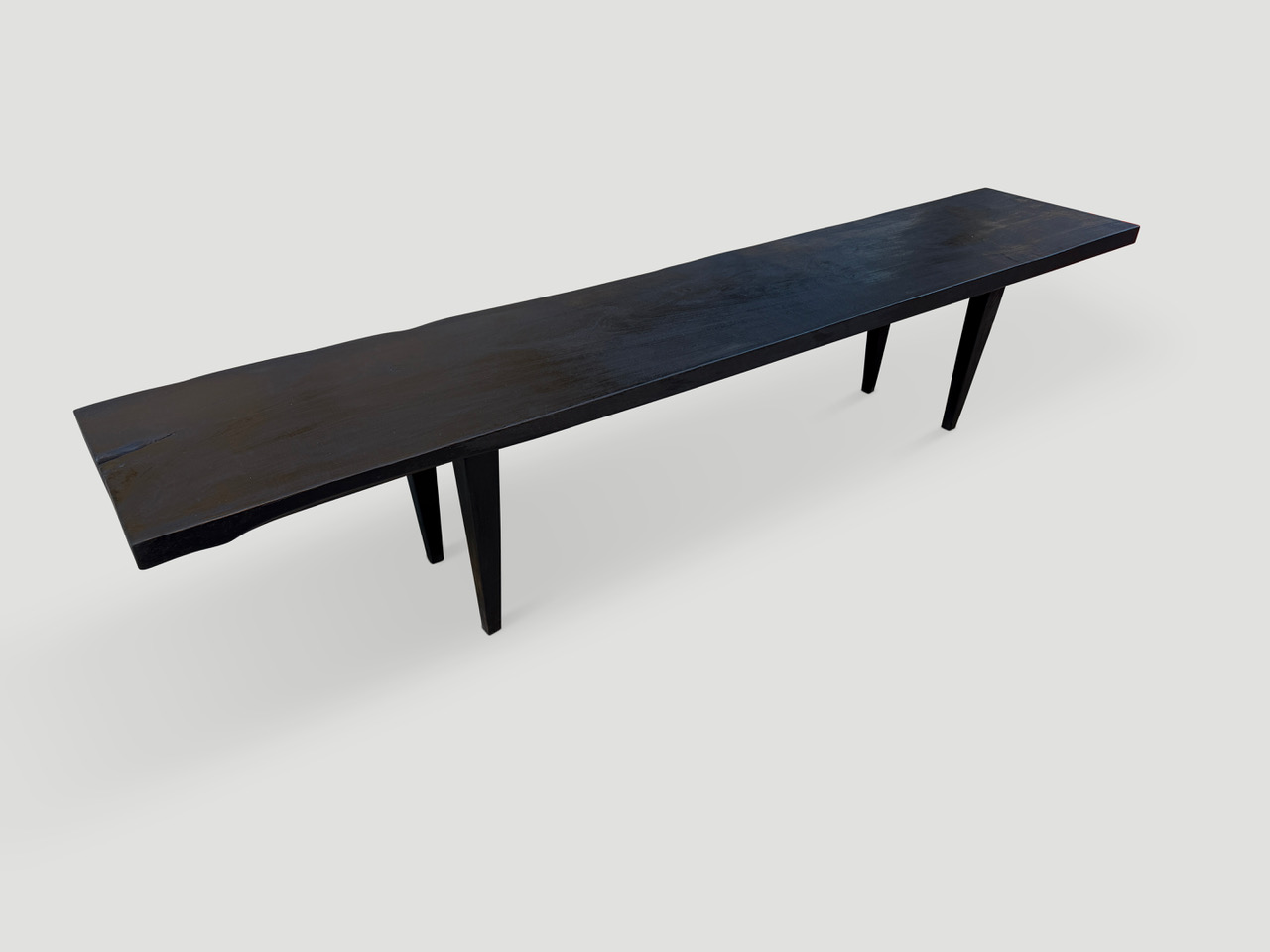 charred bench or coffee table