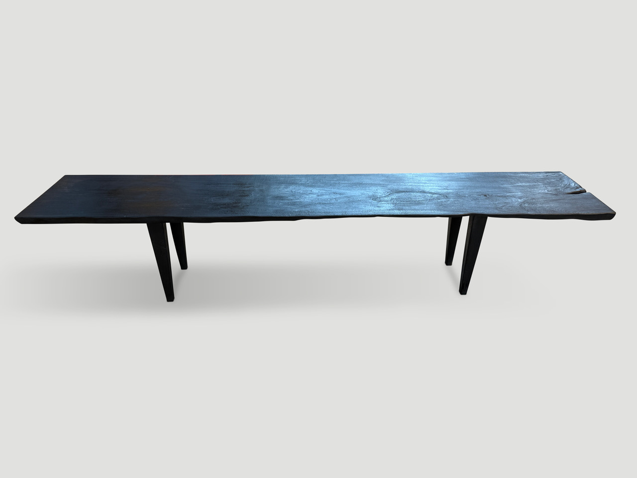 charred bench or coffee table