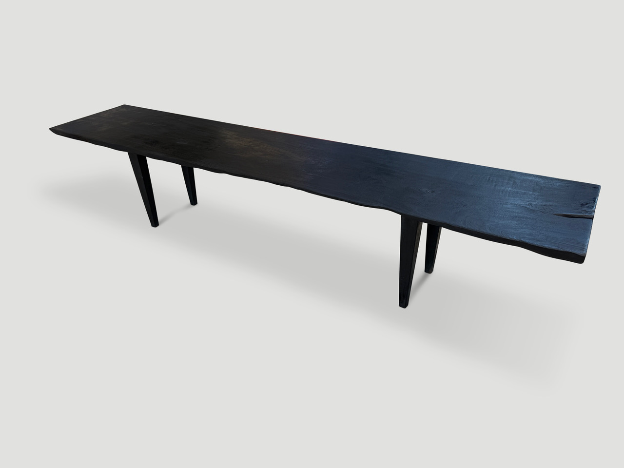 charred bench or coffee table