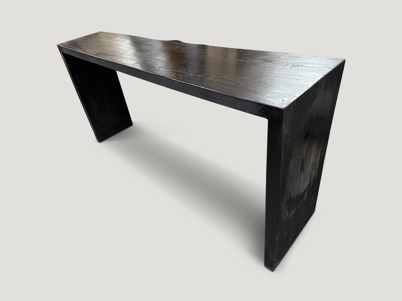 charred minimalist console table