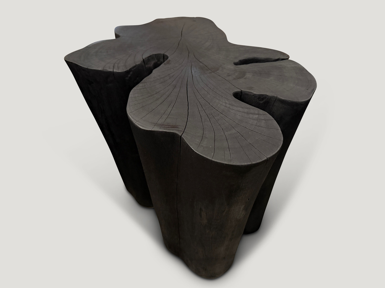 amorphous charred side table