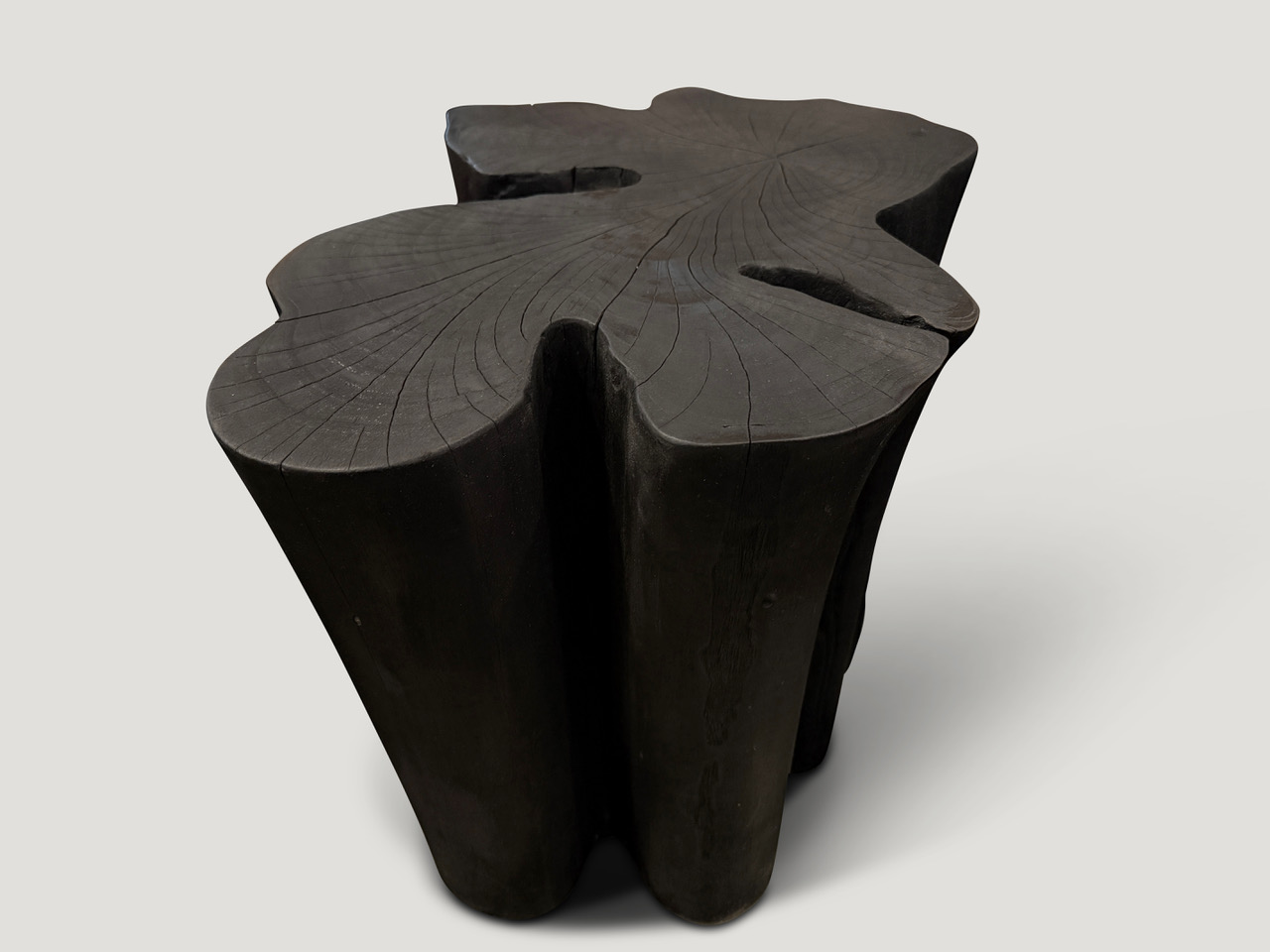 amorphous charred side table