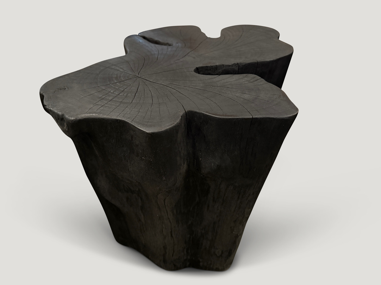 amorphous charred side table