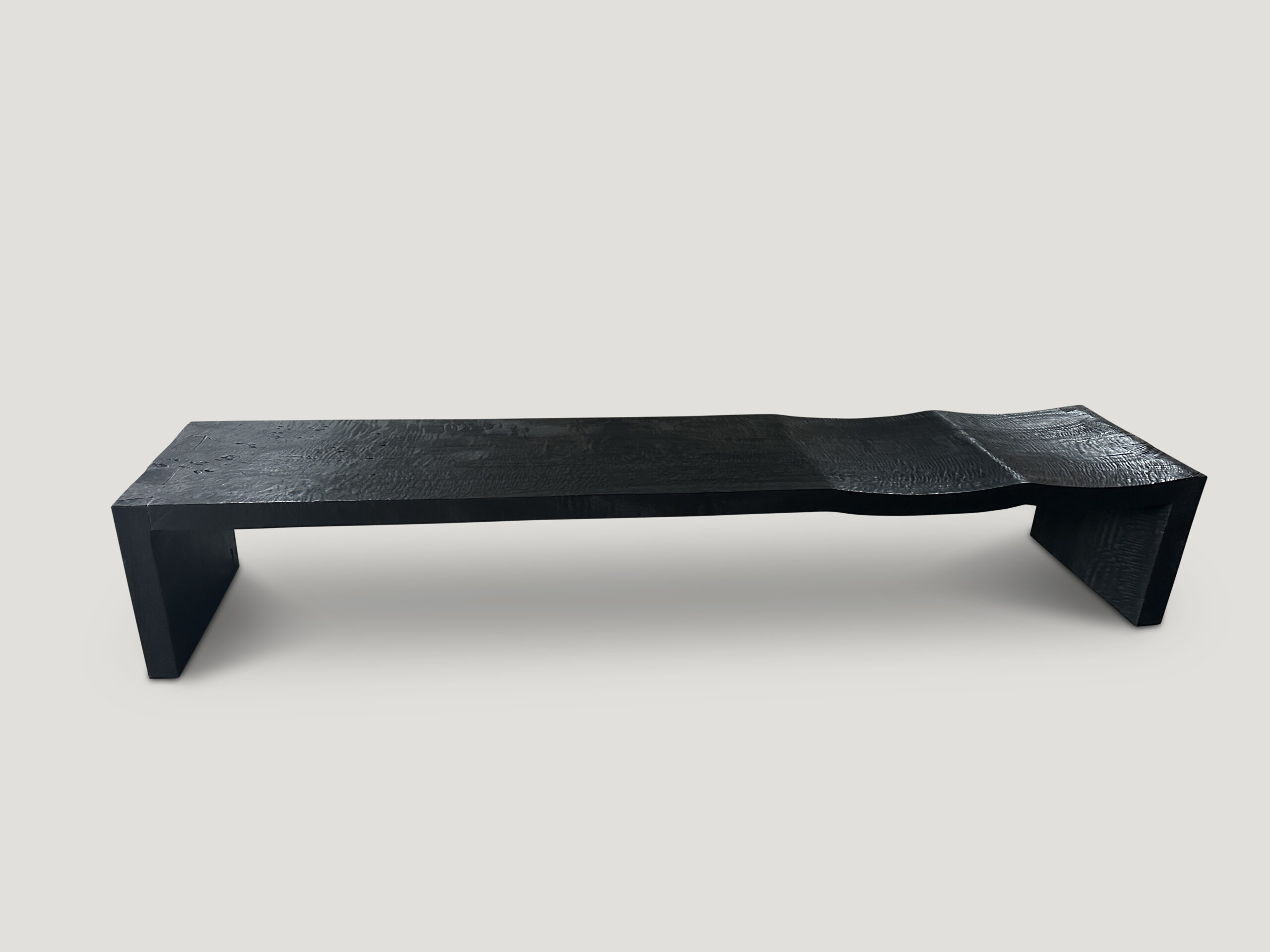 impressive minimalist charred wave bench