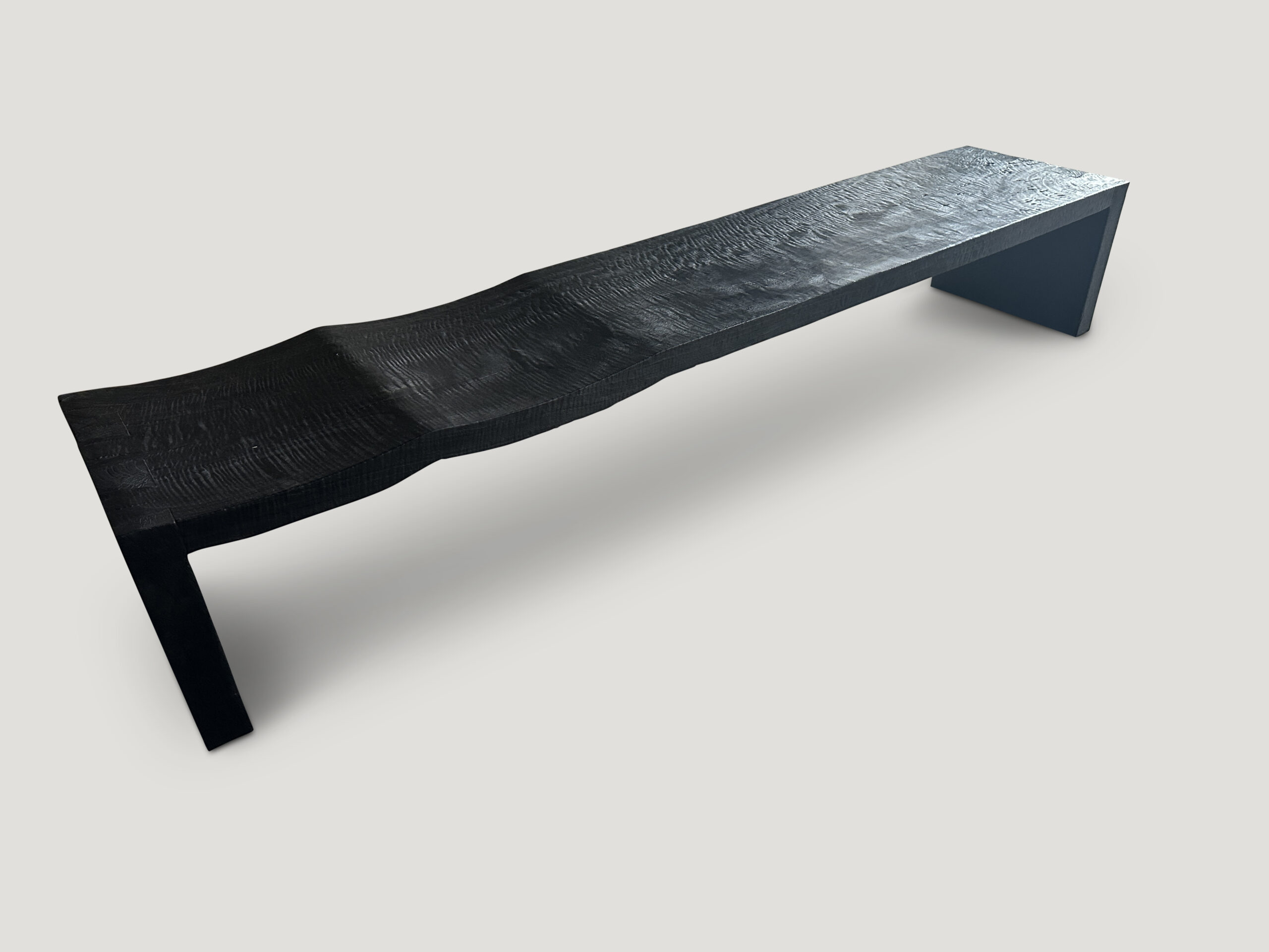 impressive minimalist charred wave bench