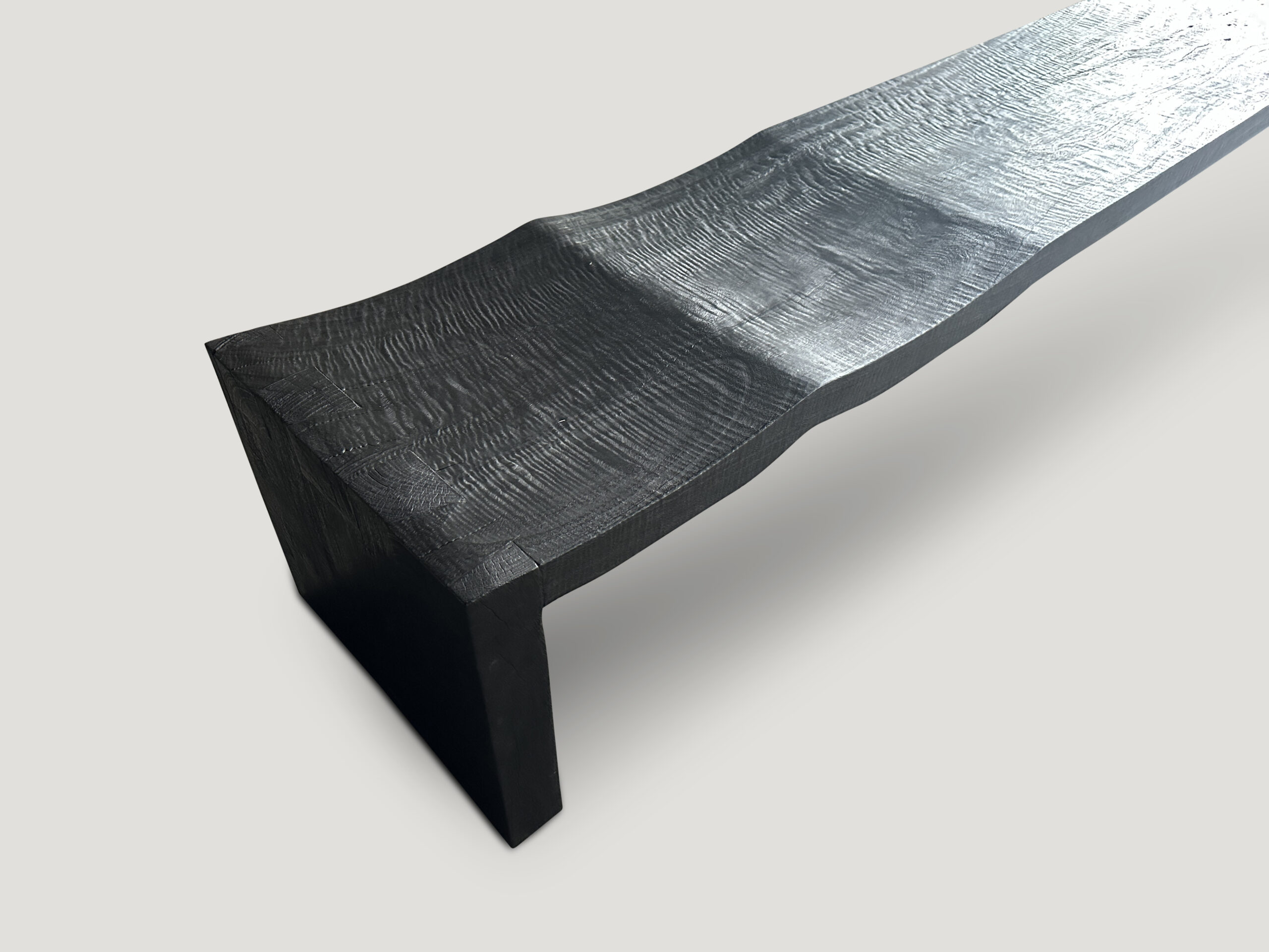 impressive minimalist charred wave bench